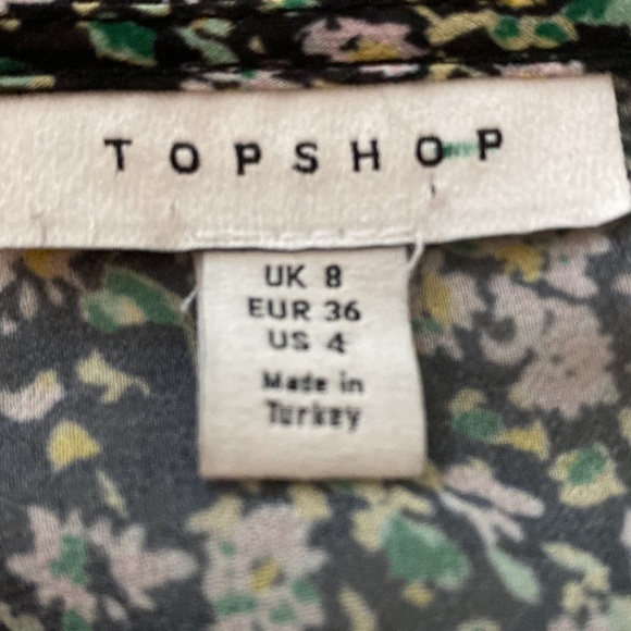 TOPSHOP top, black with floral green and rose Asymmetrical ruffles front to back - Picture 6 of 7